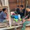 Hangatkan Kebersamaan di Tengah Hujan, Satgas TMMD Ke-128 Kodim 1204/Sanggau Nikmati Bubur Kacang Hijau Bersama Warga