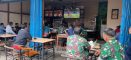 Kodim 1204/Sanggau Gelar Nobar Piala Dunia Portugal vs Kolombia Dan Pererat Kebersamaan dengan Masyarakat